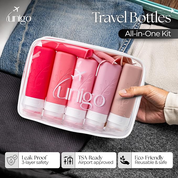 unigo Silicone Travel Bottles Set for Toiletries, Airplane Approved TSA Carry On Size, BPA Free Leakproof Refillable Squeeze Containers with Labels, Cleaning Brush and Covers (Pink)